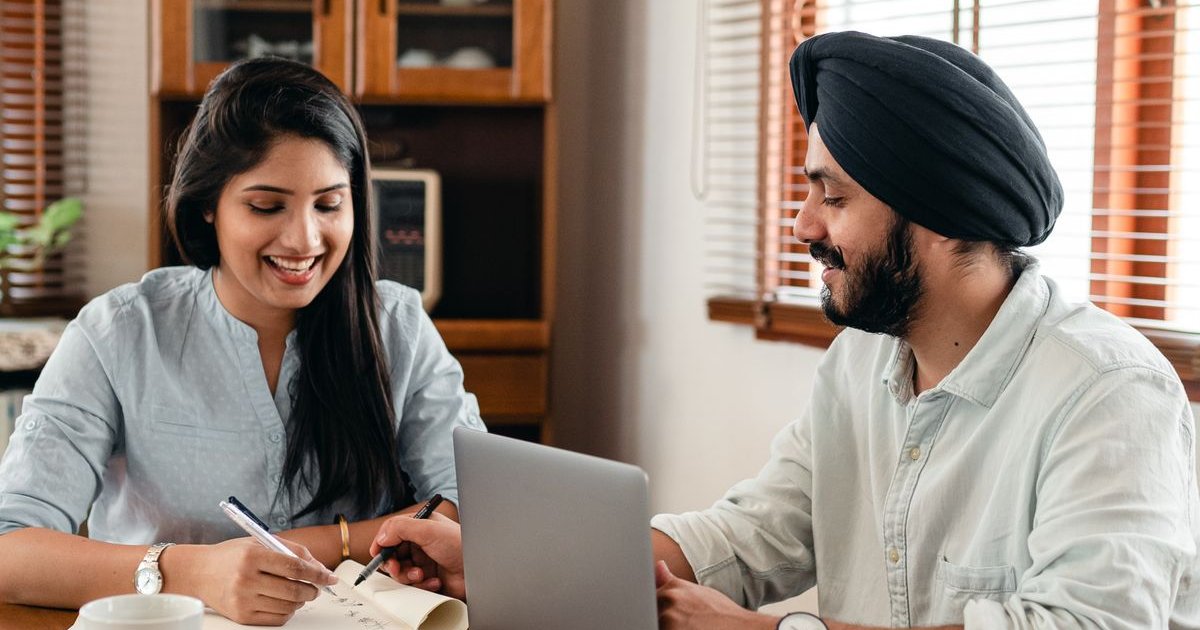 Indian student holding Australian student visa documents representing subclass 500 application
