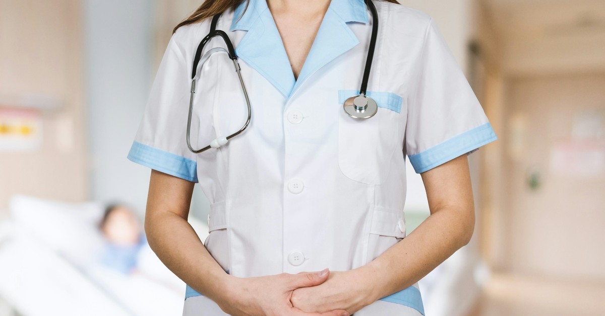 Registered nurse in uniform with a stethoscope in an Australian hospital ward