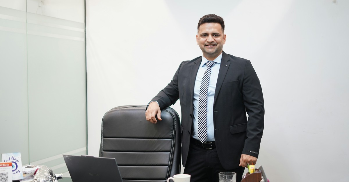Business owner in his office considering Australia business and investor PR subclass 188